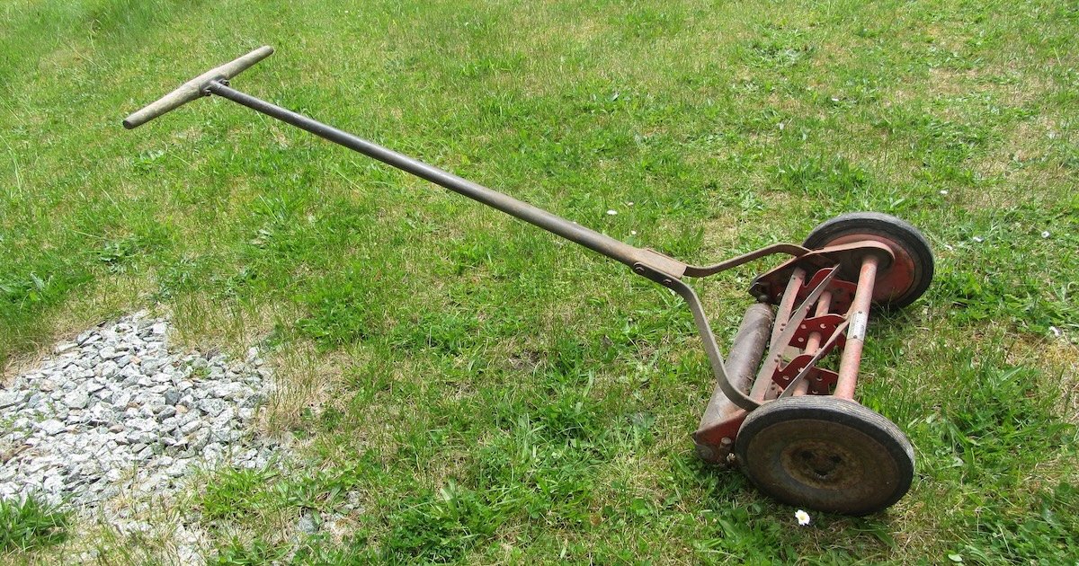 Manual mower on grass